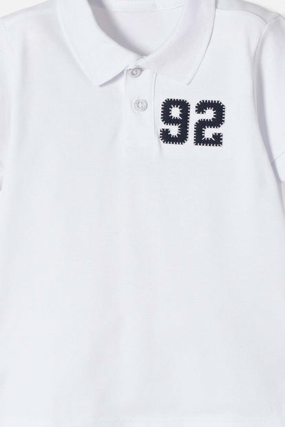 CAMISETA TIPO POLO DE LITTLEMIC BLANCO PARA NIÑO 2T A 5T