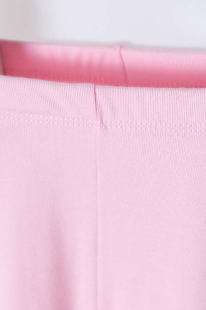 PANTALÓN DE MINNIE MOUSE CON PIES CUBIERTOS ROSADO Y BLANCO PARA BEBÉ NIÑA